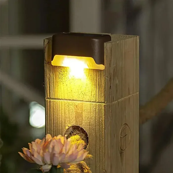 Solar-powered fence light